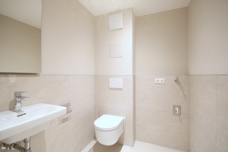 G�ste-WC mit Waschmaschinenanschluss Dachgeschosswohnung Kempten
